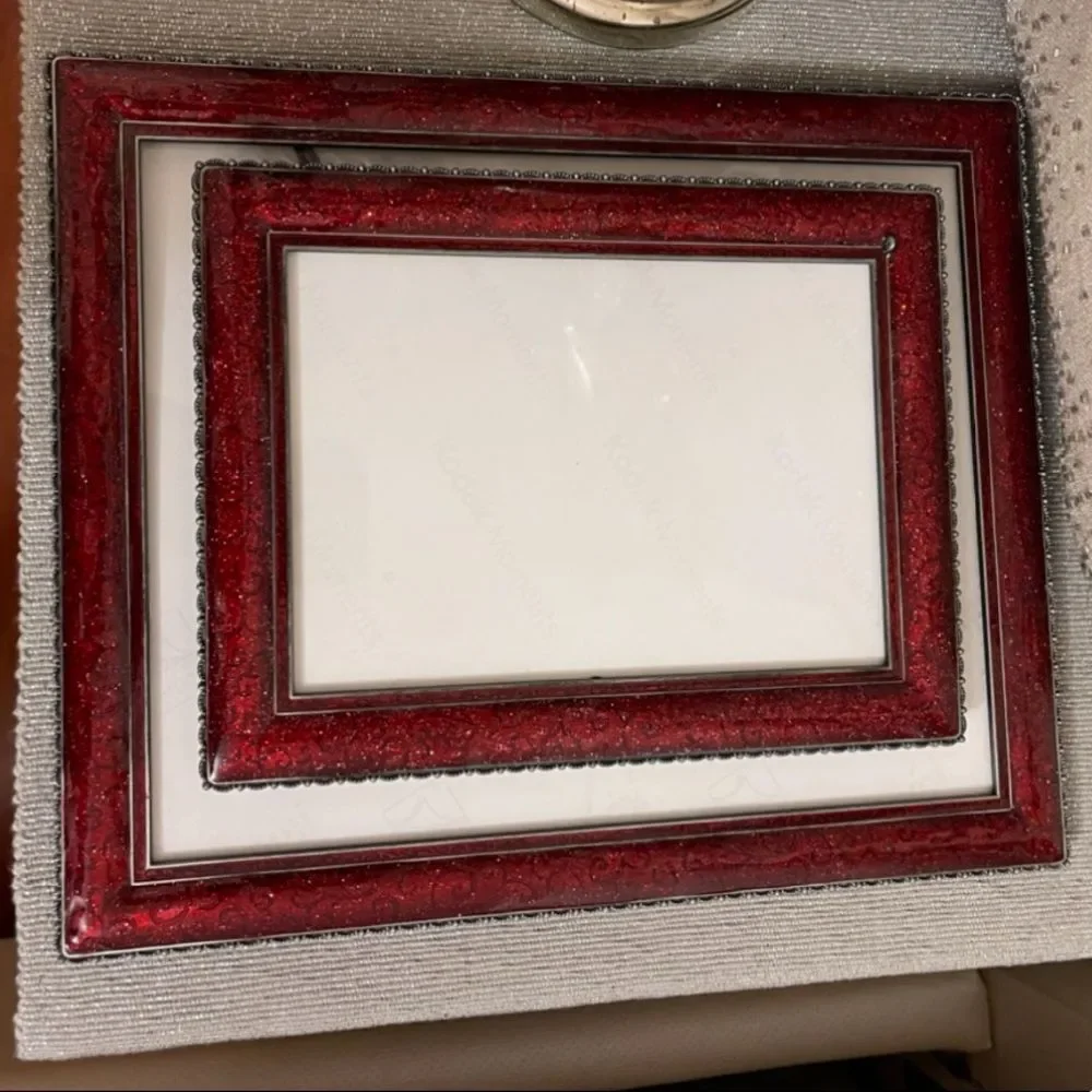 Three burgundy frames